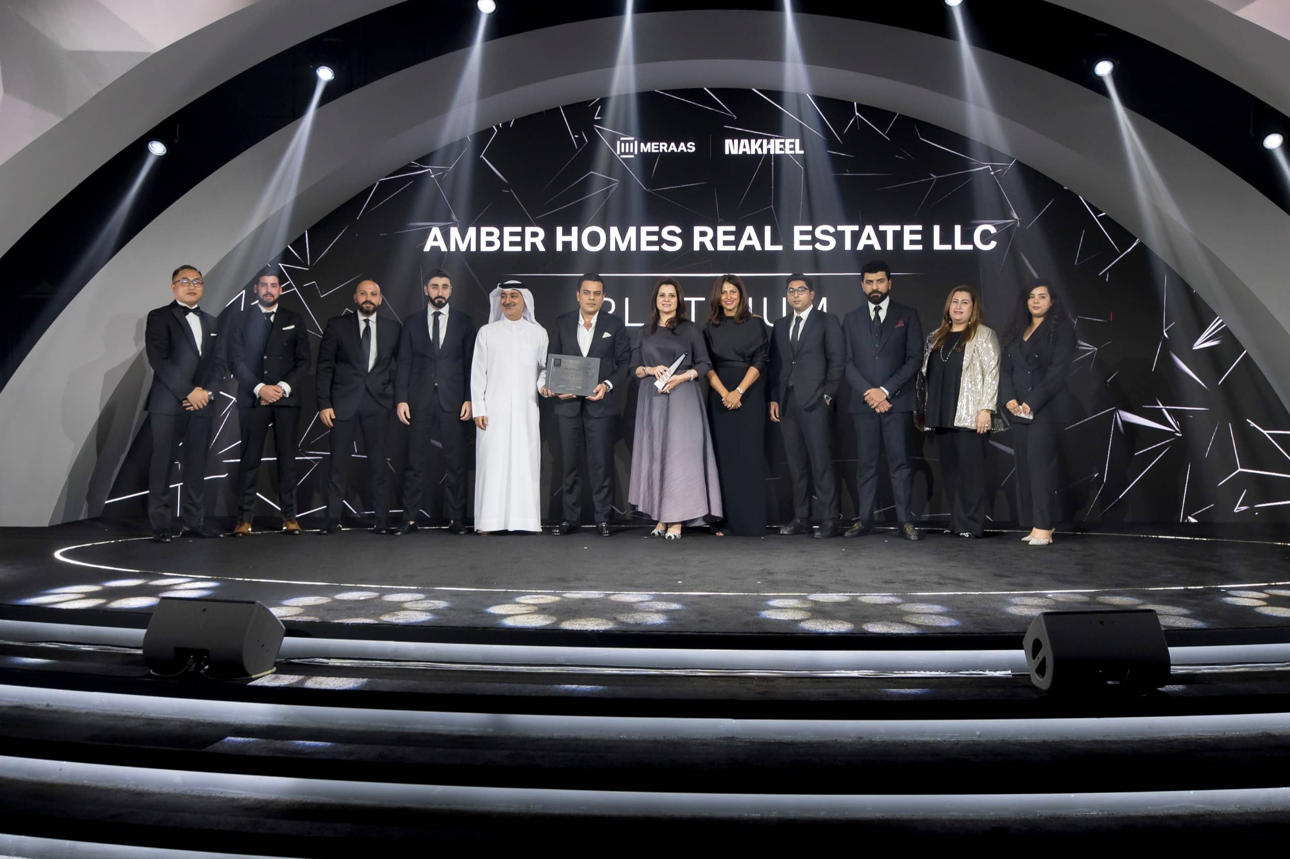 Amber Homes team receiving the Black Onyx award in Dubai