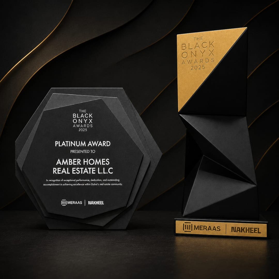 Amber Homes Real Estate — Platinum Sales Agency 2025, awarded by Meraas, Nakheel & Dubai Holding (award trophy and certificate)
